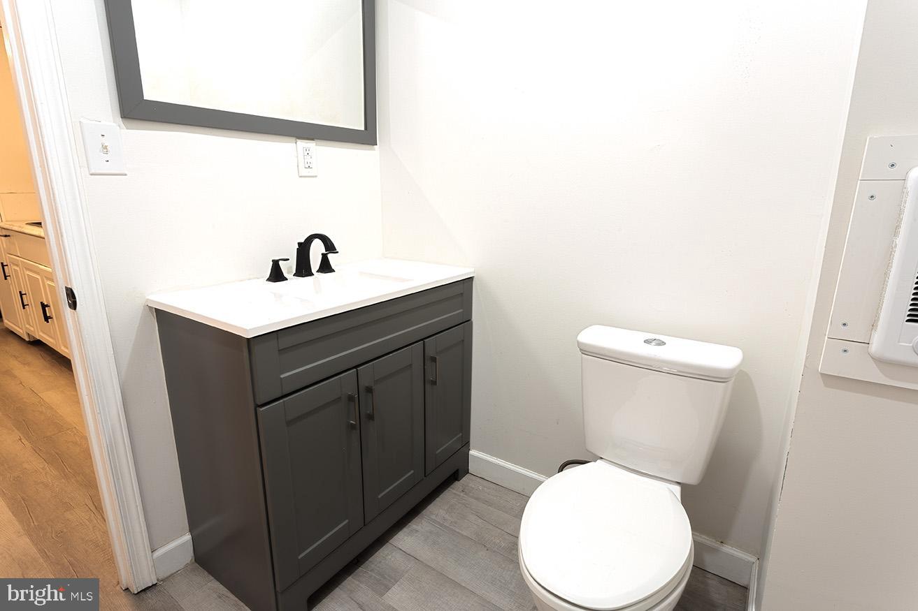 417 North 2nd Street Reading, PA 19601 - Photo 11 of 22 a white toilet sitting next to a bathroom sink