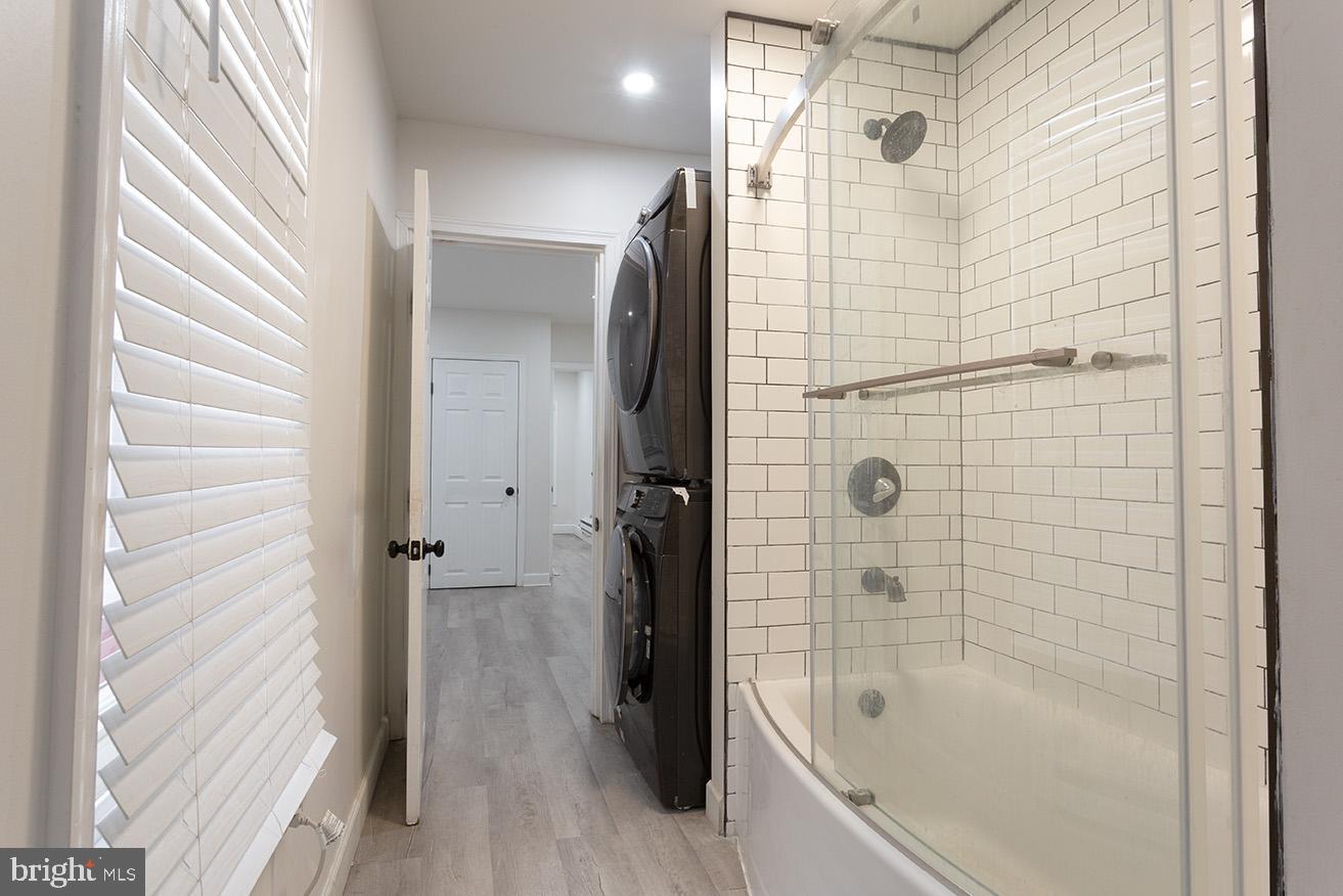 417 North 2nd Street Reading, PA 19601 - Photo 18 of 22 a bathroom with a bathtub and a shower