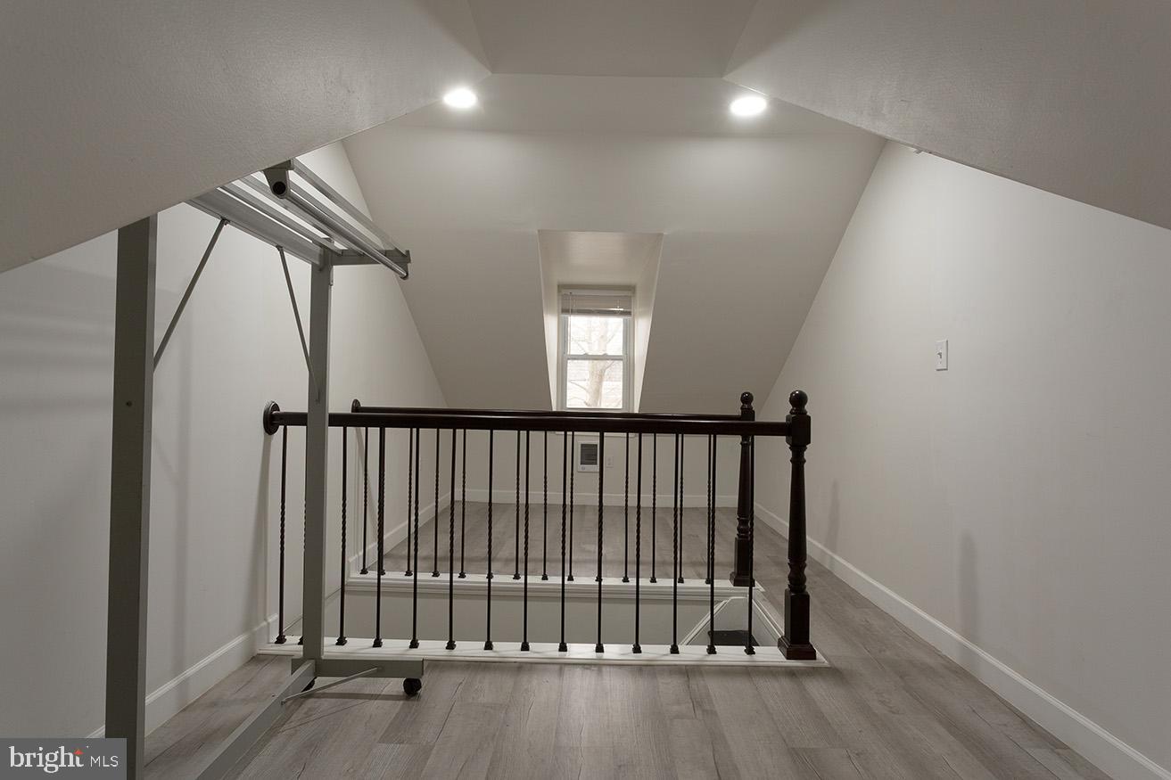 417 North 2nd Street Reading, PA 19601 - Photo 20 of 22 a view of staircase with railing and a window