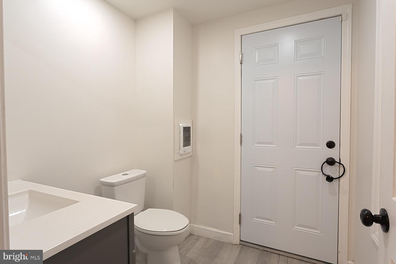 417 North 2nd Street Reading, PA 19601 - Photo 10 of 22 a white toilet sitting next to a bathroom sink