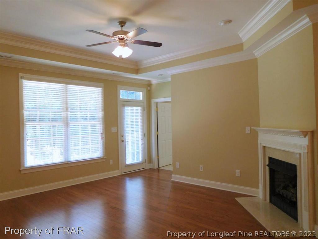 2641 Lockwood Road, Unit 202 Fayetteville, NC 28303 - Photo 17 of 36 a view of an empty room with wooden floor and a window