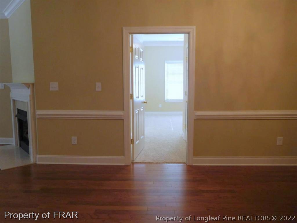 2641 Lockwood Road, Unit 202 Fayetteville, NC 28303 - Photo 19 of 36 a view of empty room with wooden floor