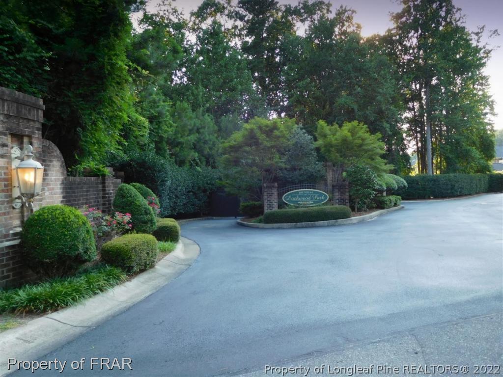 2641 Lockwood Road, Unit 202 Fayetteville, NC 28303 - Photo 2 of 36 a couple of potted plants in front of a house