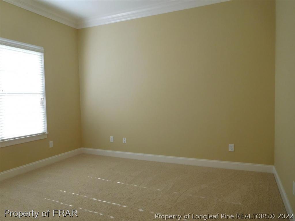 2641 Lockwood Road, Unit 202 Fayetteville, NC 28303 - Photo 21 of 36 an empty room with a window