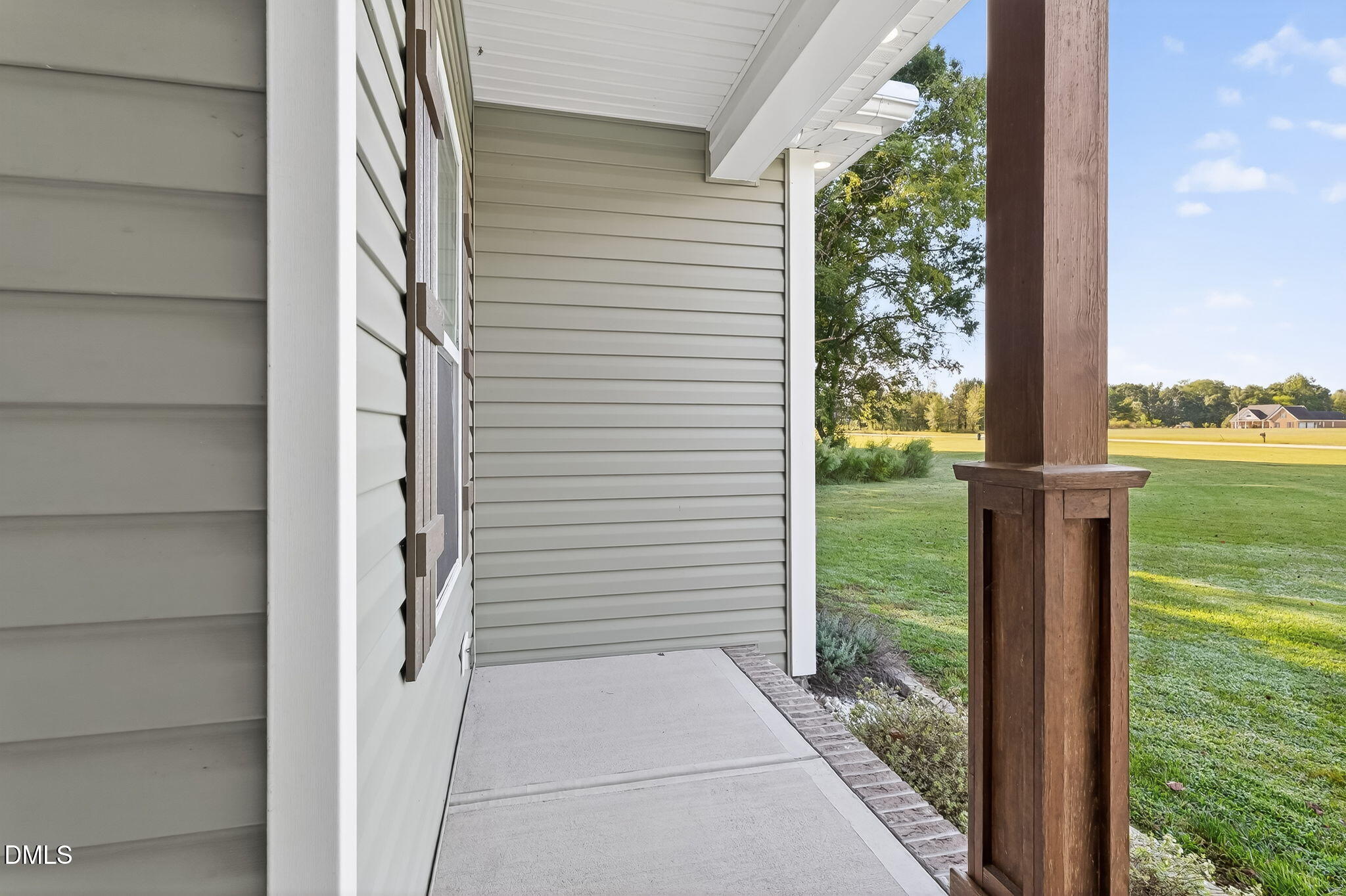 238 Deer Path Farms Road Erwin, NC 28339 - Photo 8 of 49 a view of a balcony with floor to ceiling windows