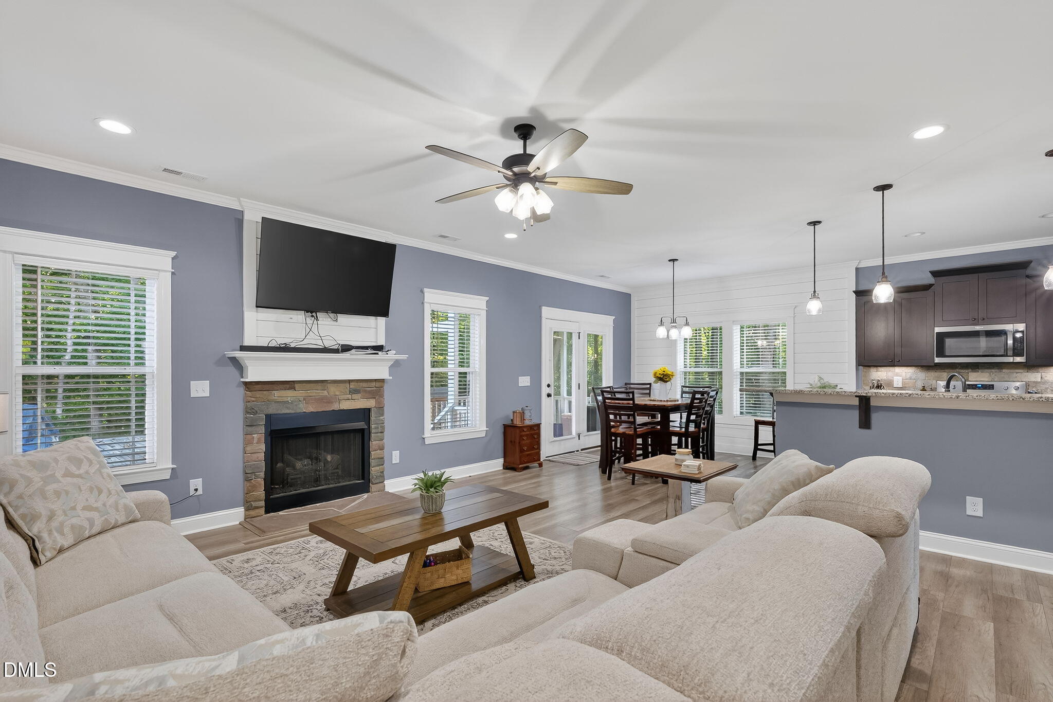 238 Deer Path Farms Road Erwin, NC 28339 - Photo 10 of 49 a living room with furniture fireplace and a flat screen tv