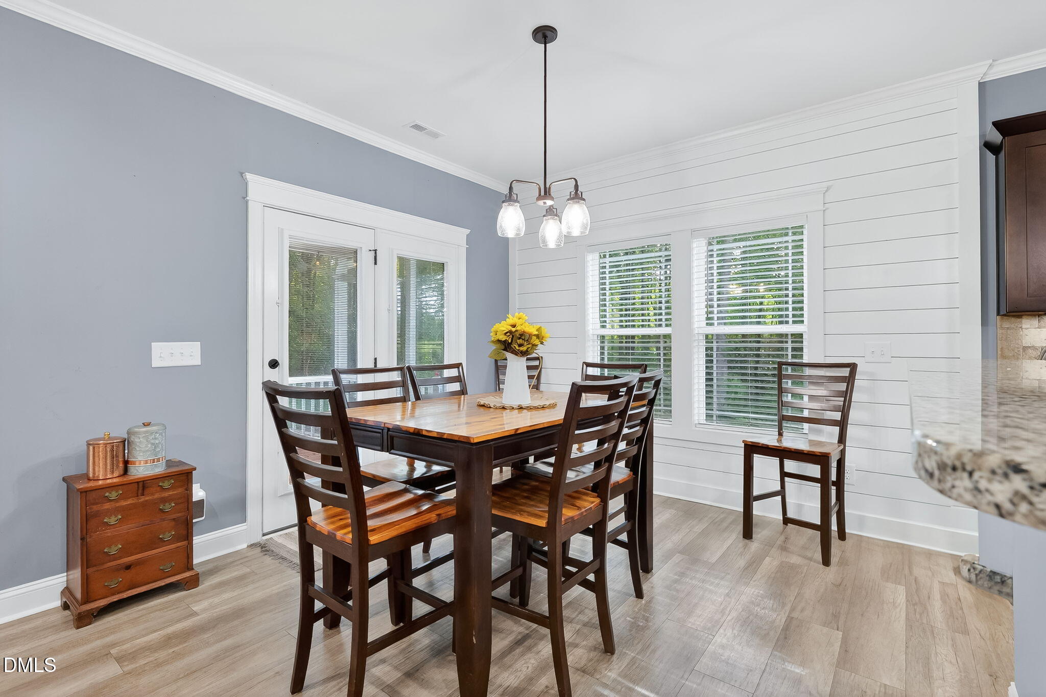 238 Deer Path Farms Road Erwin, NC 28339 - Photo 18 of 49 a view of a dining room with furniture and chandelier