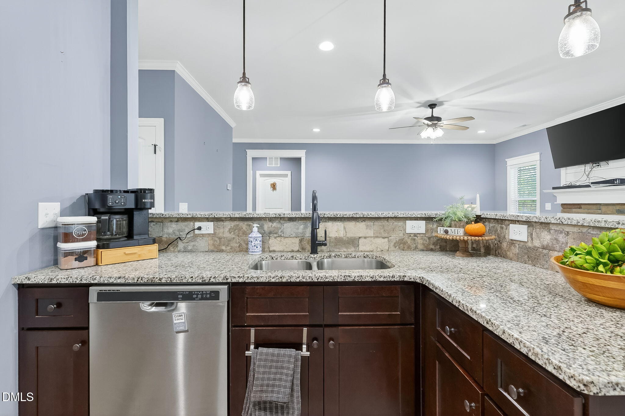 238 Deer Path Farms Road Erwin, NC 28339 - Photo 23 of 49 a kitchen with a sink a counter space cabinets and appliances
