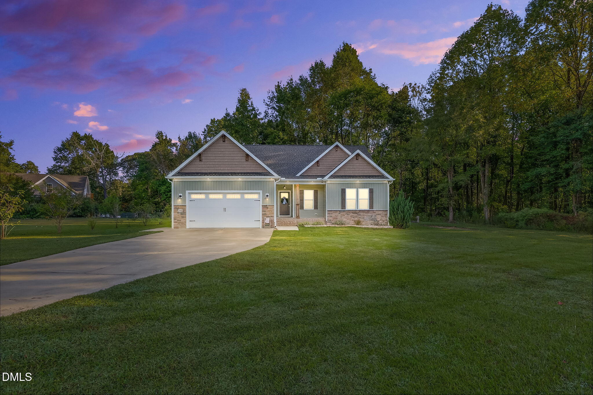 238 Deer Path Farms Road Erwin, NC 28339 - Photo 2 of 49 a front view of a house with a yard