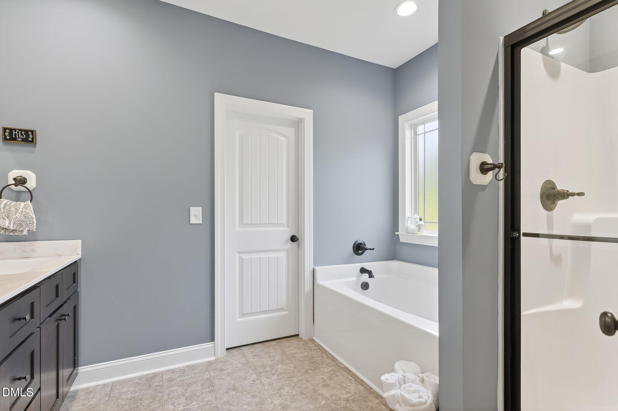 238 Deer Path Farms Road Erwin, NC 28339 - Photo 30 of 49 a white bath tub sitting next to a white sink