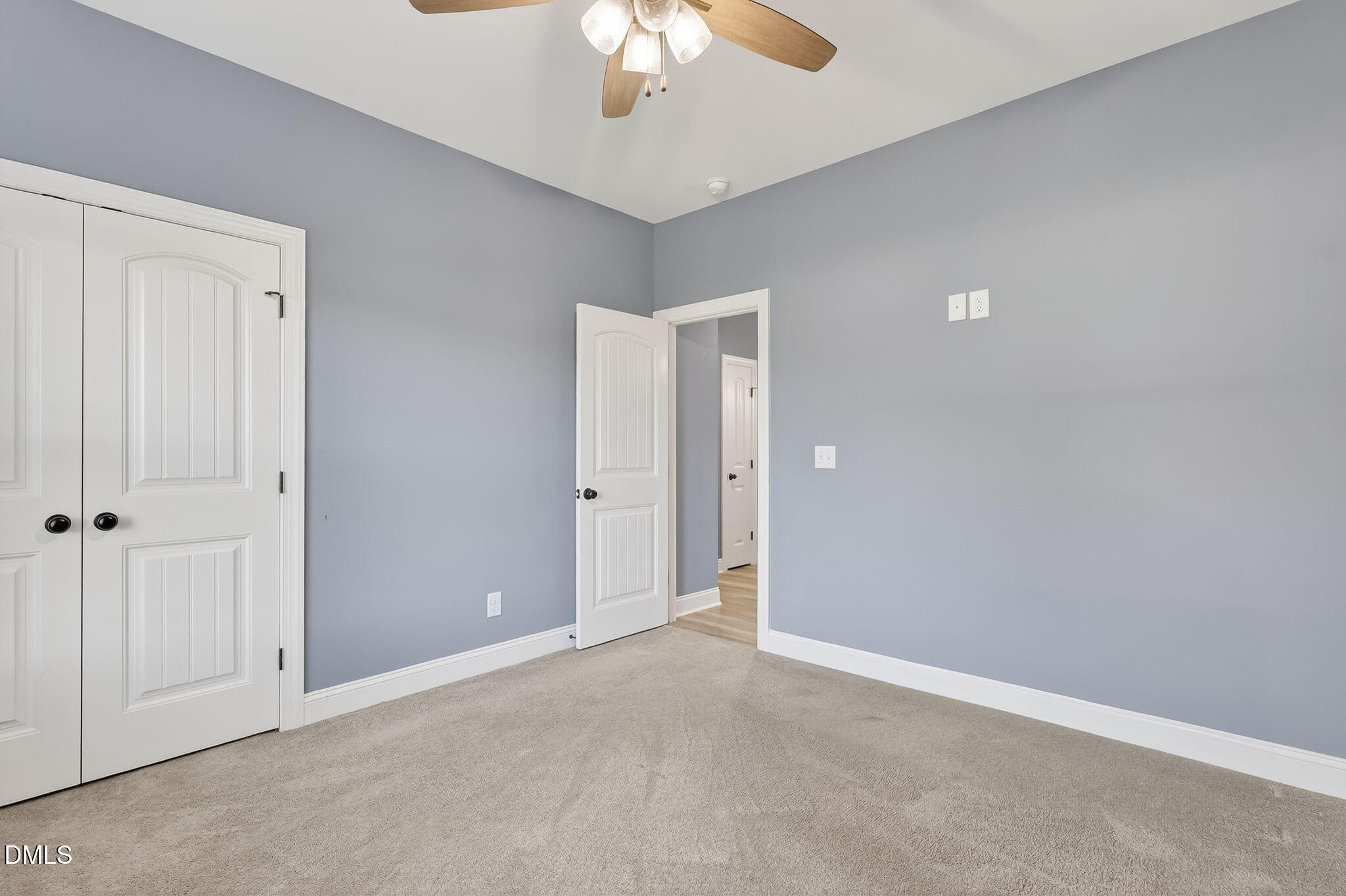 238 Deer Path Farms Road Erwin, NC 28339 - Photo 34 of 49 a view of an empty room and chandelier fan