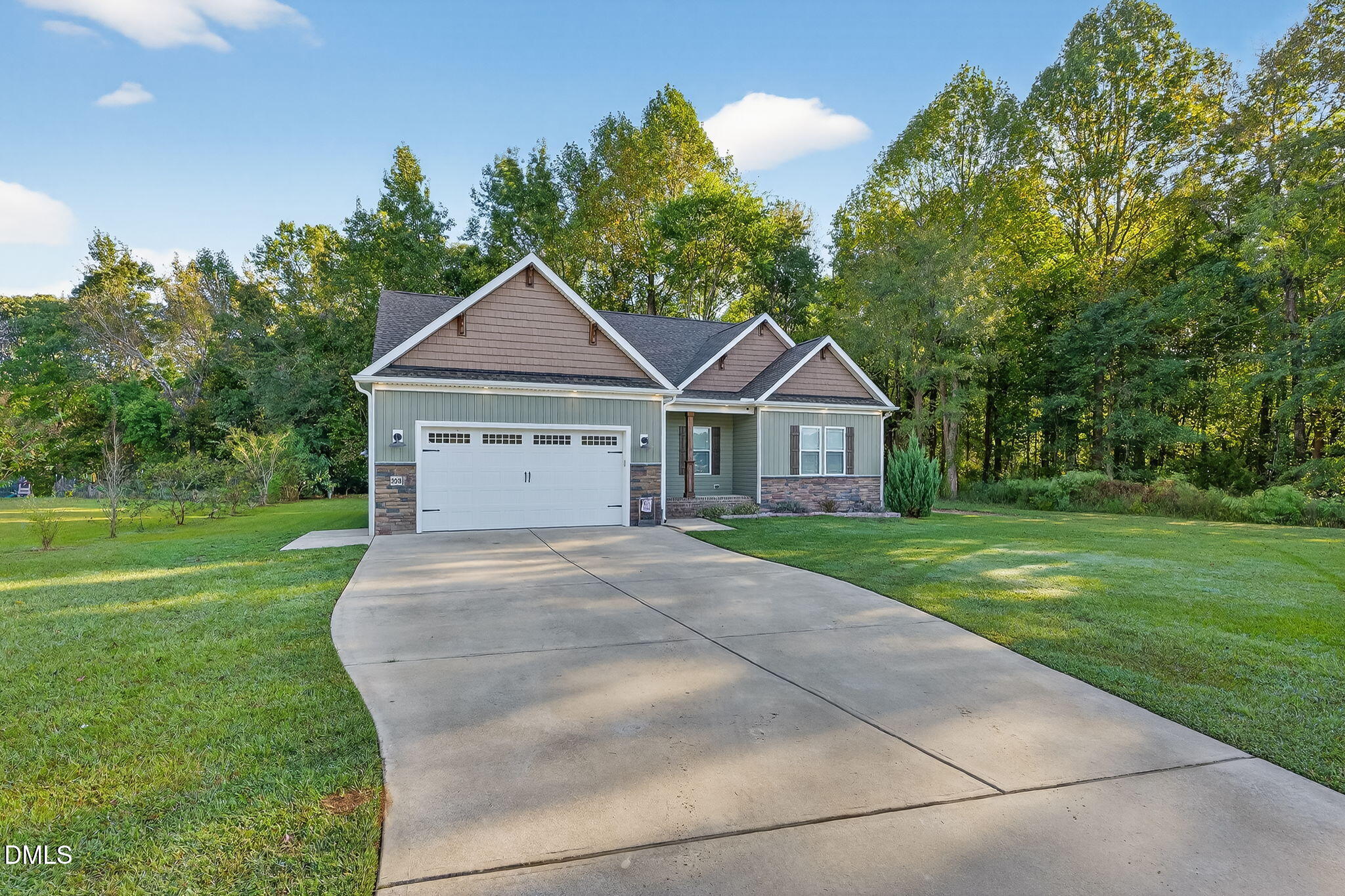 238 Deer Path Farms Road Erwin, NC 28339 - Photo 4 of 49 a front view of a house with a yard