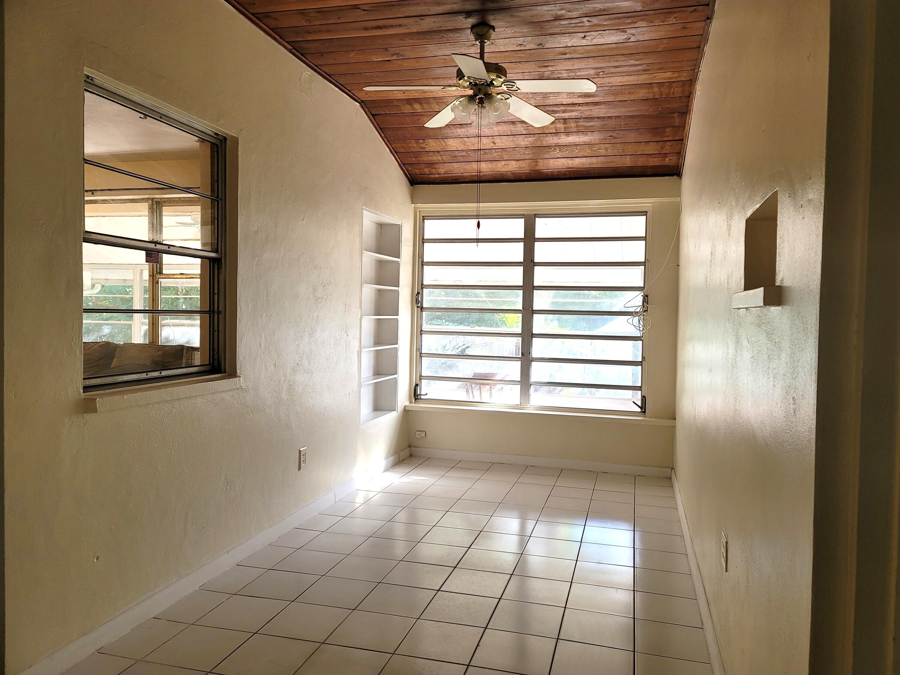 4362 West Midway Road Fort Pierce, FL 34981 - Photo 14 of 31 a view of an empty room with a window