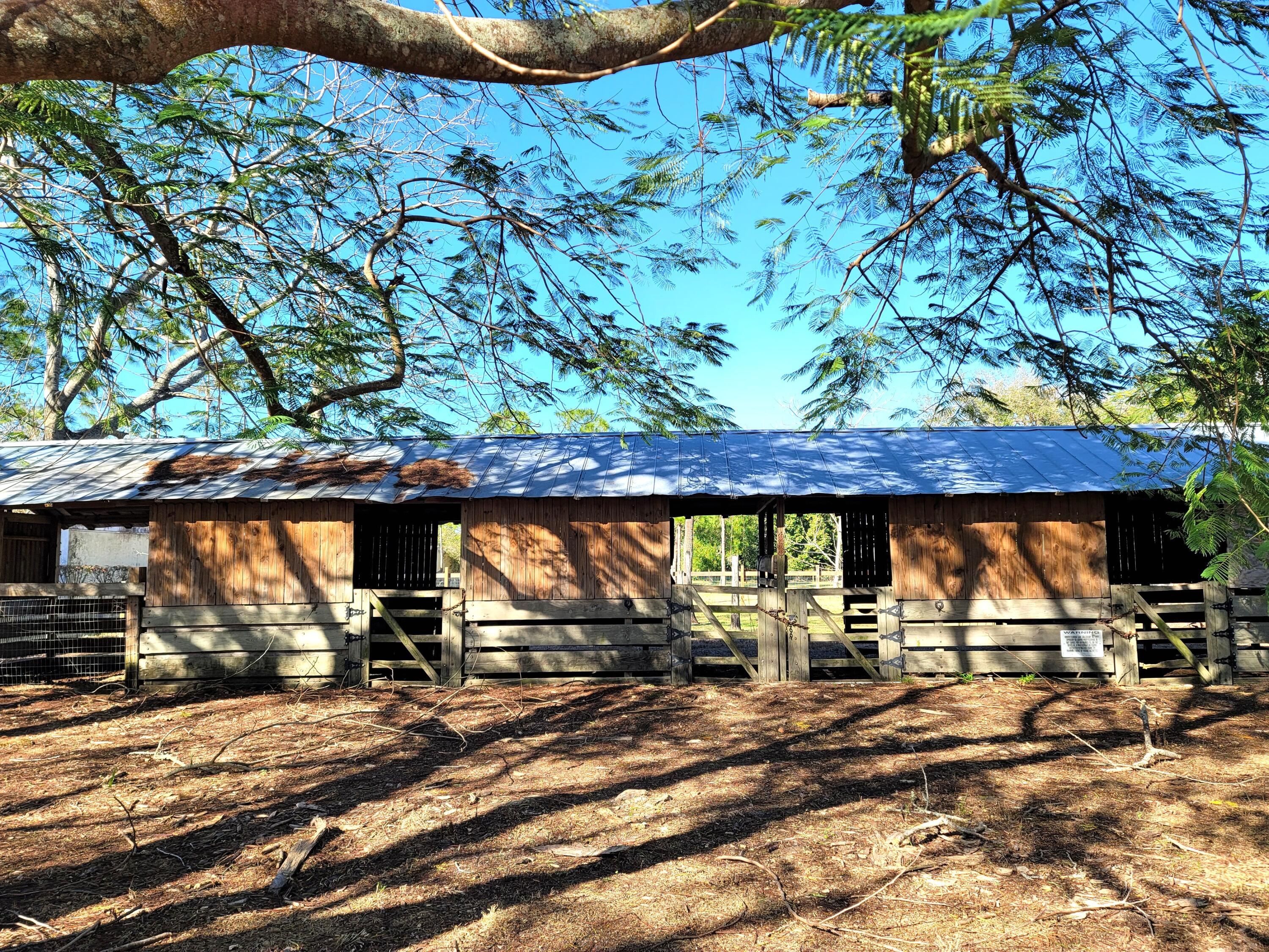 4362 West Midway Road Fort Pierce, FL 34981 - Photo 22 of 31 a view of outdoor space with garden