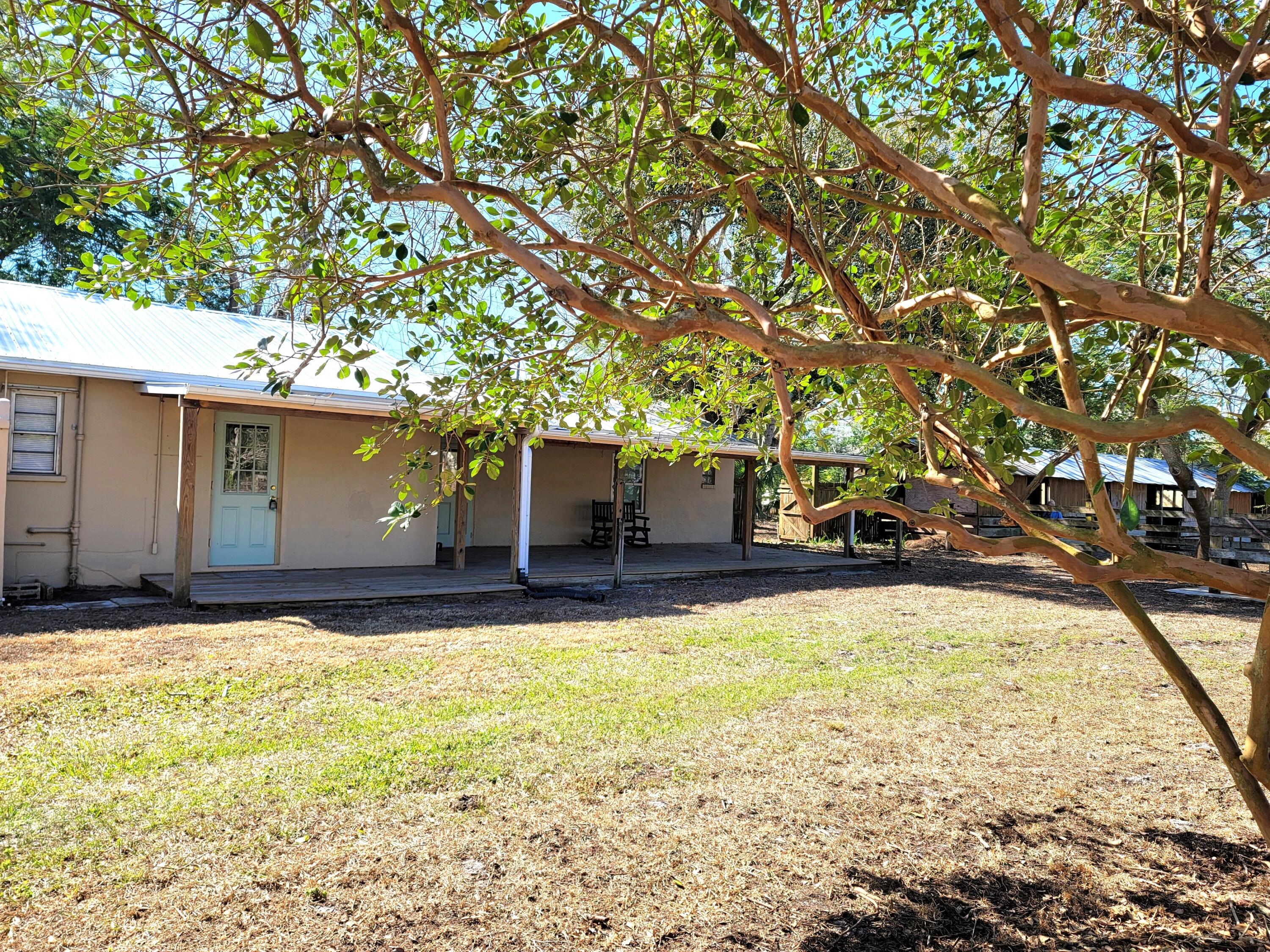 4362 West Midway Road Fort Pierce, FL 34981 - Photo 3 of 31 a view of swimming pool with an outdoor space