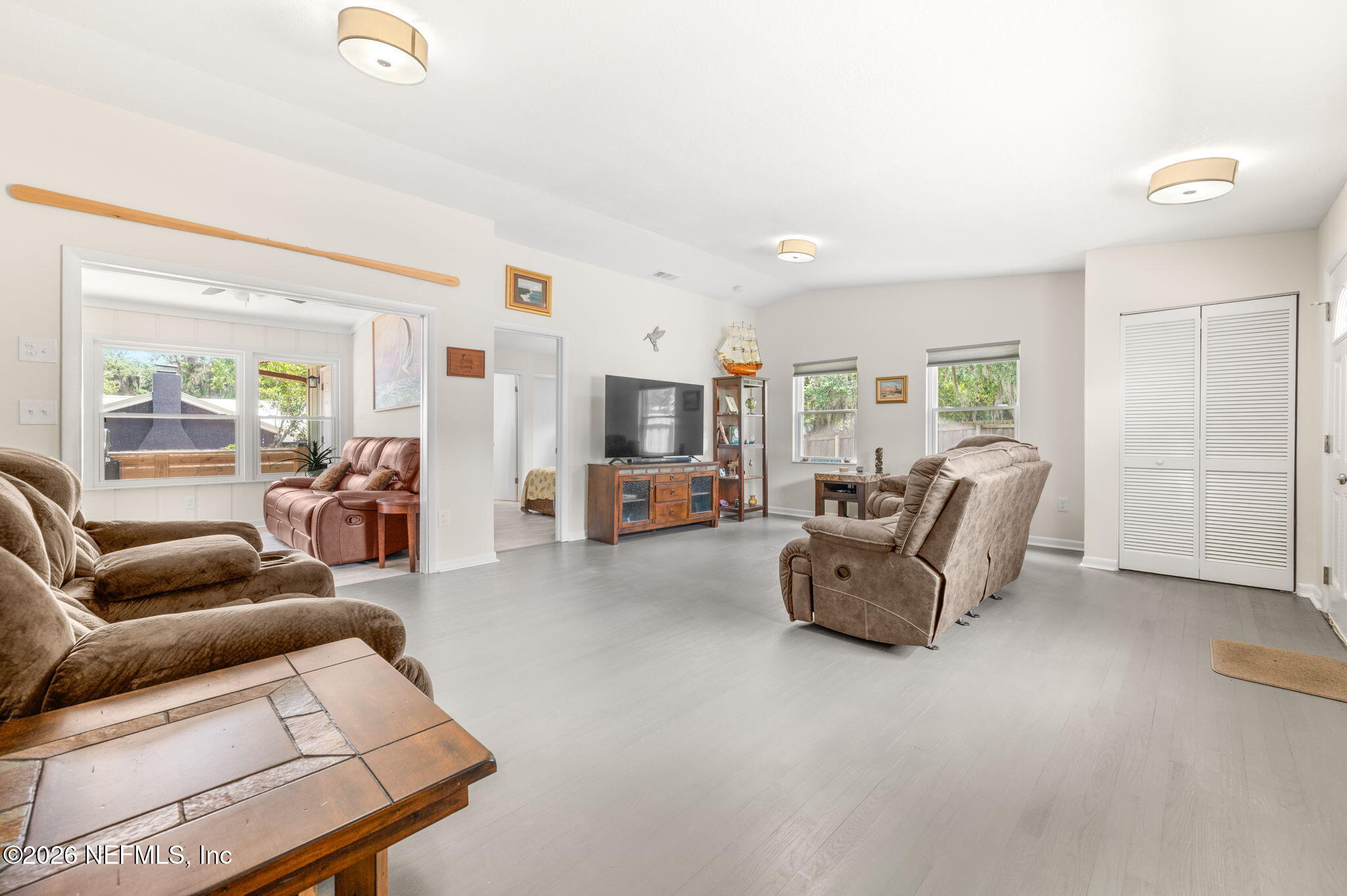 507 Gentian Road St. Augustine, FL 32086 - Photo 7 of 82 a living room with furniture and a flat screen tv
