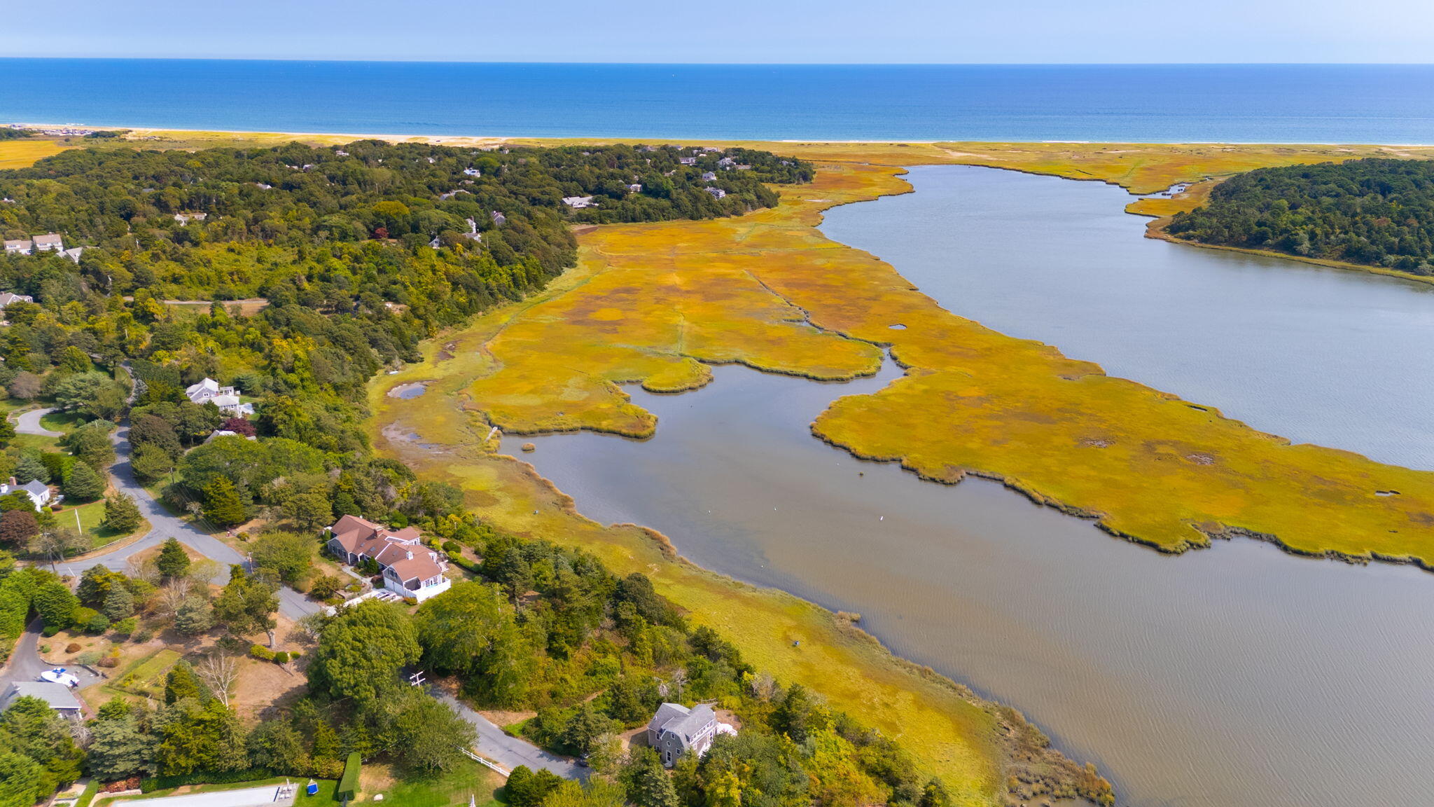63 Briar Spring Road Orleans, MA 02653 - Photo 30 of 37 a view of an ocean beach and an ocean