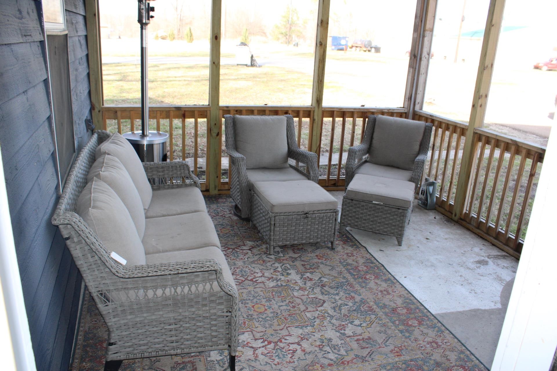 5787 Richardson Landing Road Drummonds, TN 38023 - Photo 2 of 37 a living room with furniture and a floor to ceiling window