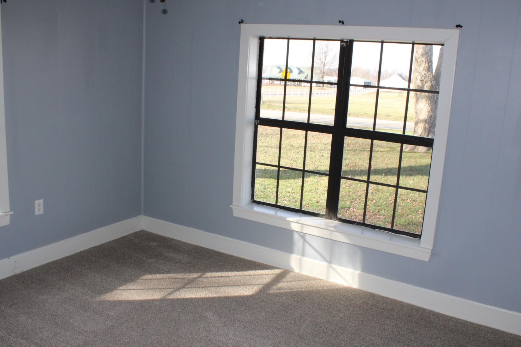 5787 Richardson Landing Road Drummonds, TN 38023 - Photo 27 of 37 an empty room with a window