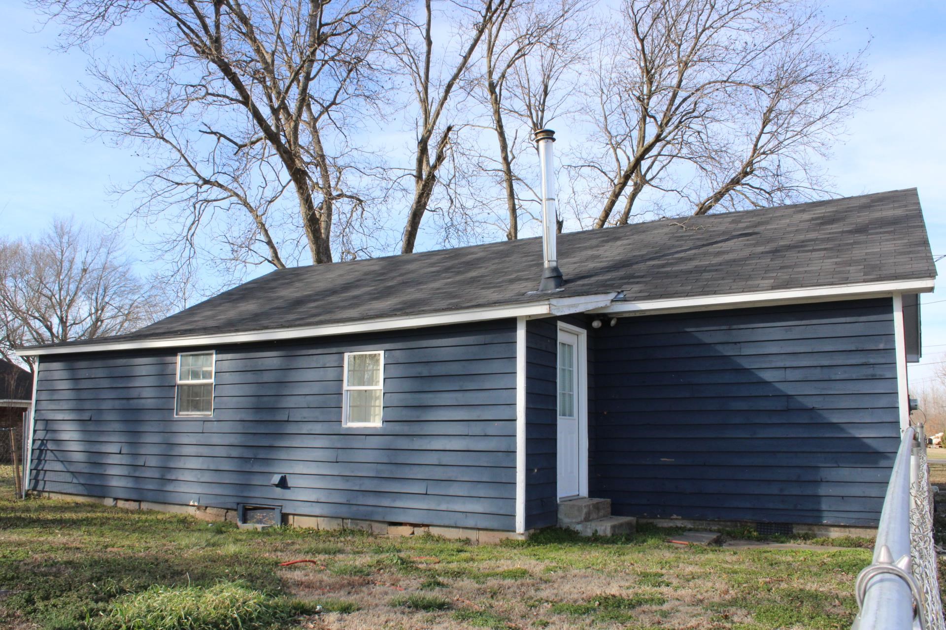 5787 Richardson Landing Road Drummonds, TN 38023 - Photo 28 of 37 a view of a house with a yard