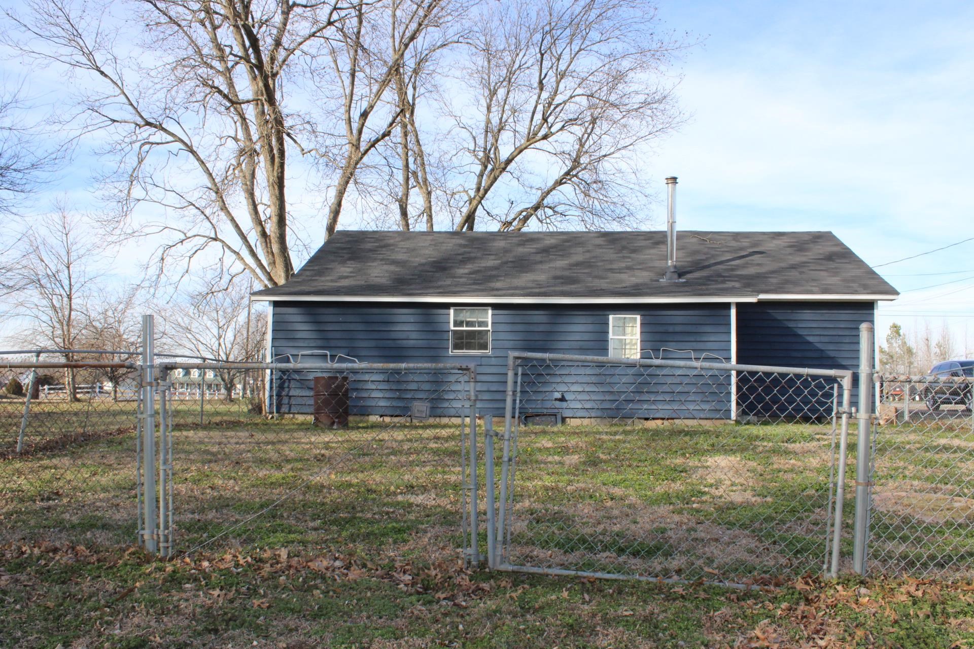 5787 Richardson Landing Road Drummonds, TN 38023 - Photo 29 of 37 a view of a house with a yard