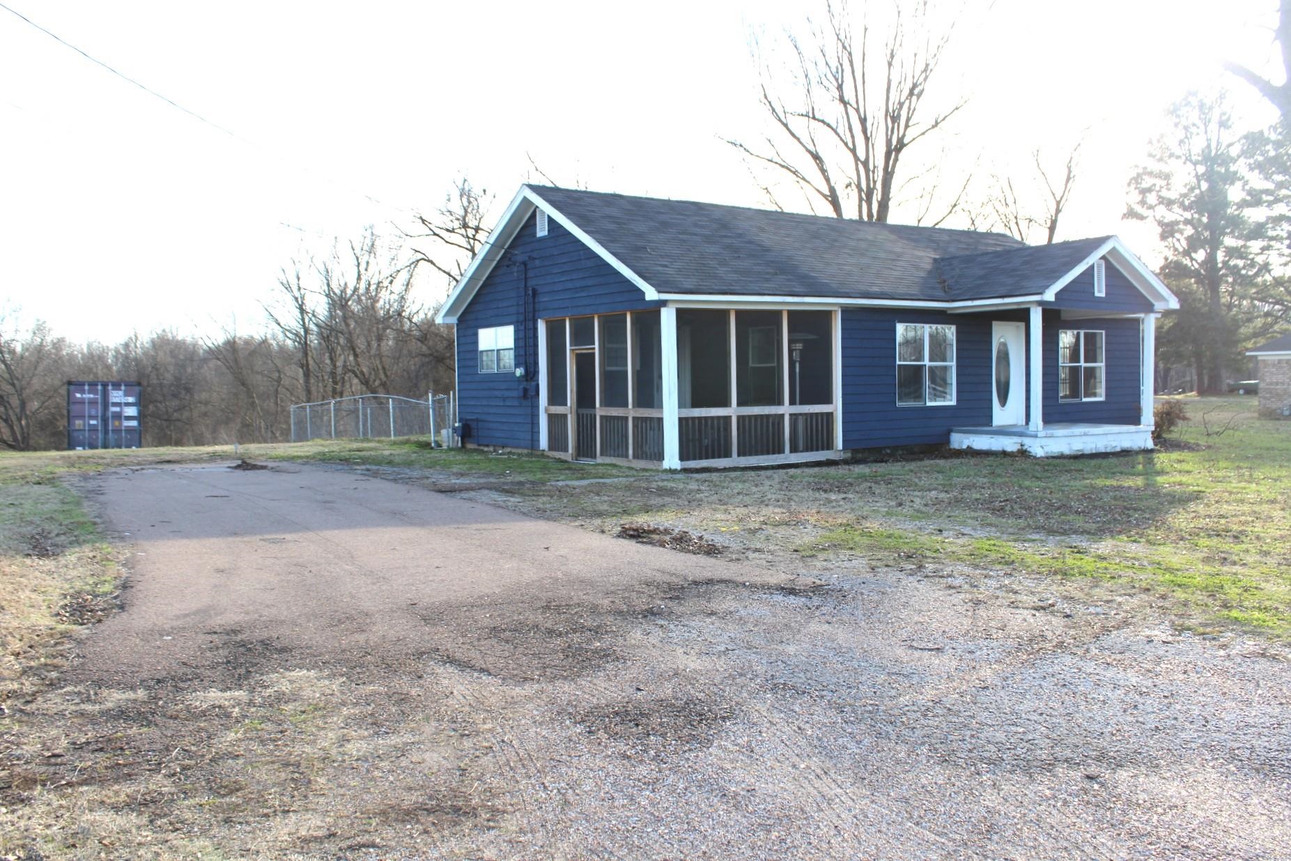 5787 Richardson Landing Road Drummonds, TN 38023 - Photo 37 of 37 front view of a house with a yard