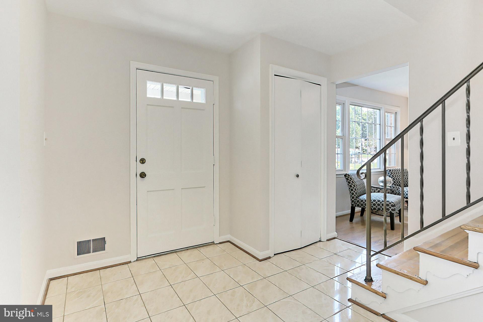 6808 Sydenstricker Road Springfield, VA 22153 - Photo 8 of 65 Foyer and coat closet