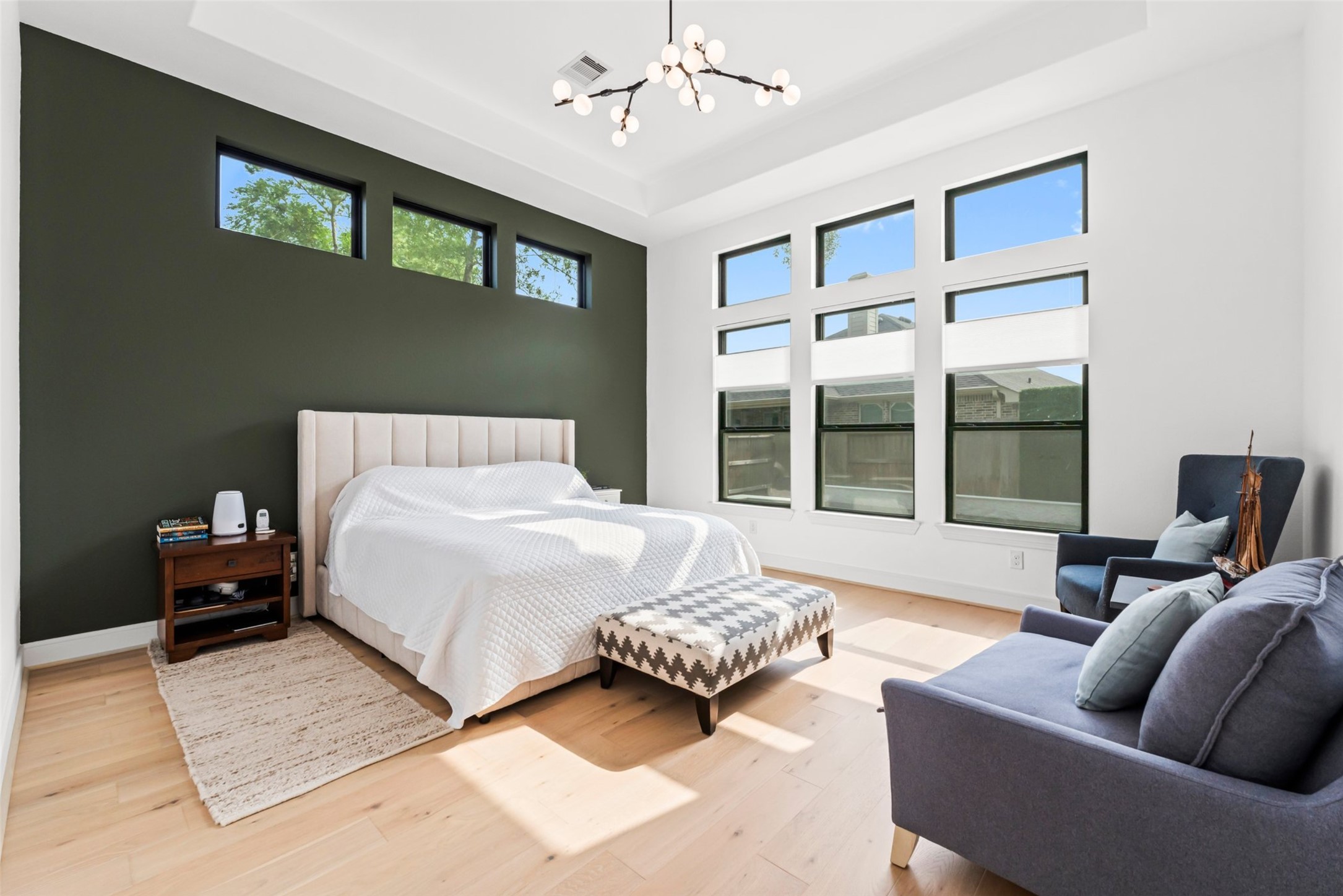1053 Bat Hawk Court Conroe, TX 77385 - Photo 26 of 50 a spacious bedroom with a bed and glass window