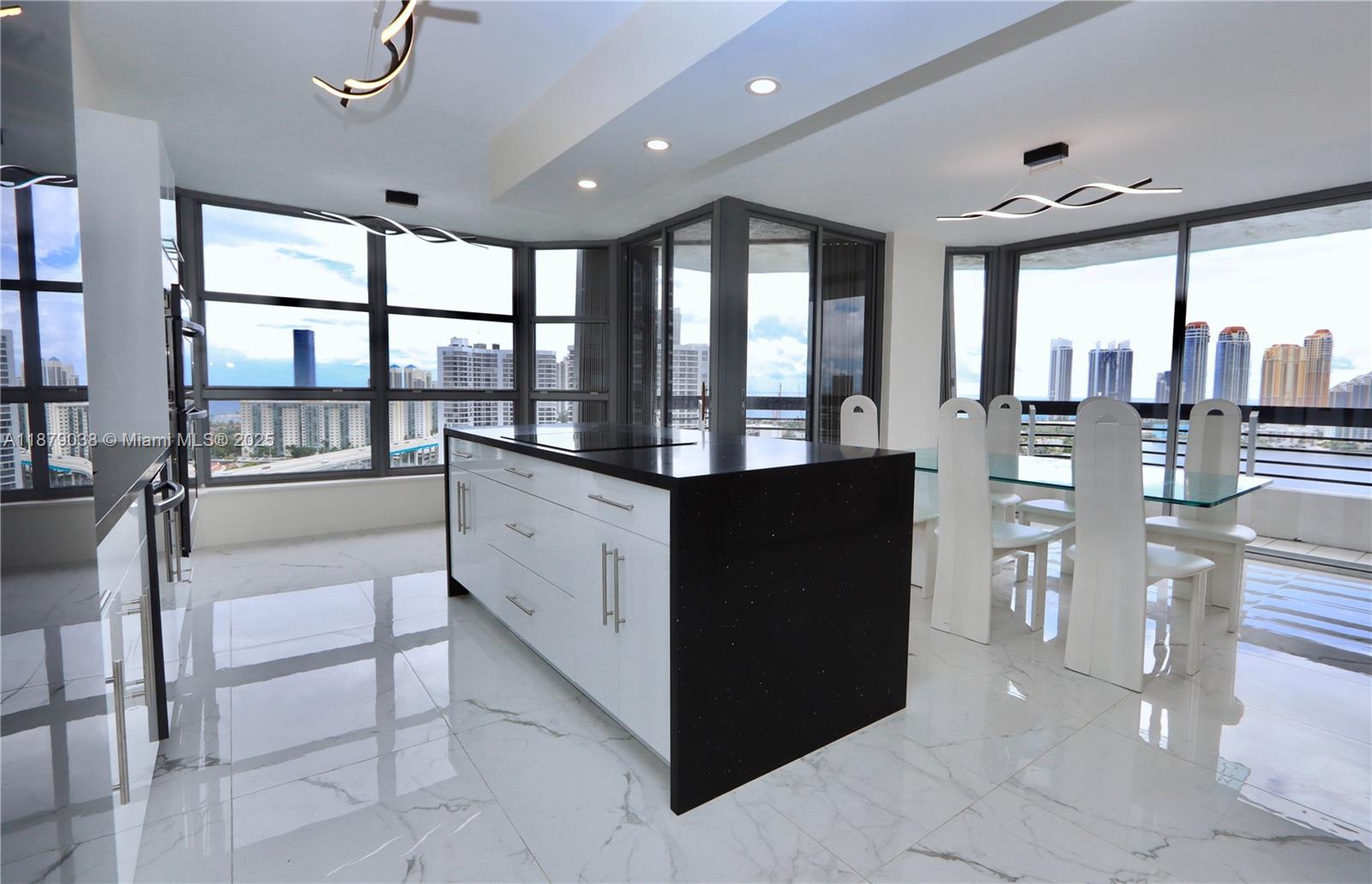 a view of a large living room and a large window