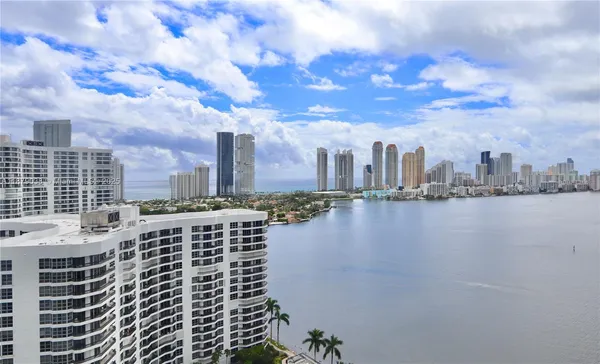 a view of a city with tall buildings