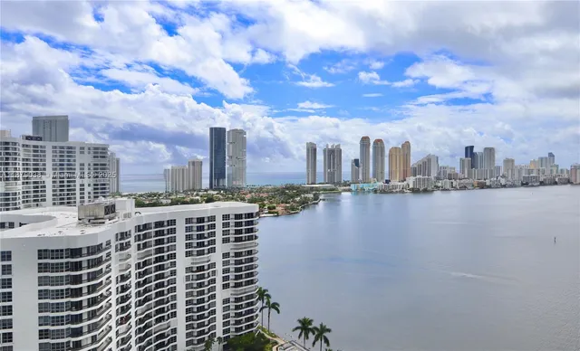 a view of a city with tall buildings