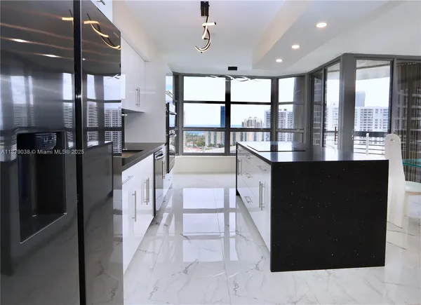 a lobby with furniture and window