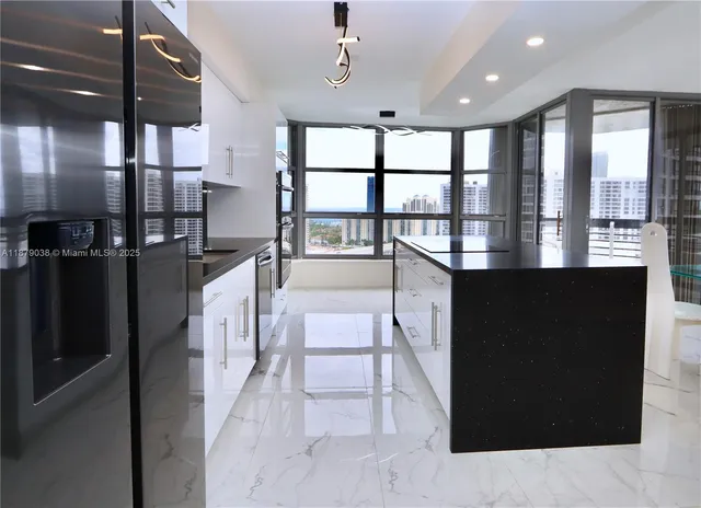 a lobby with furniture and window