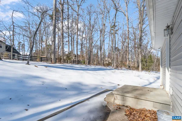 a view of a backyard of the house