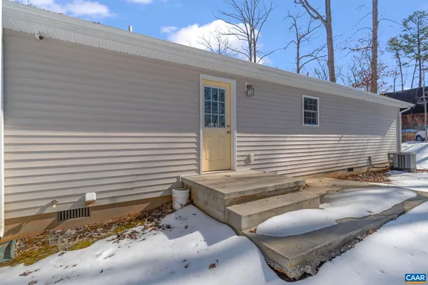 a view of a back yard of the house