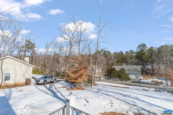 a view of a backyard with a patio
