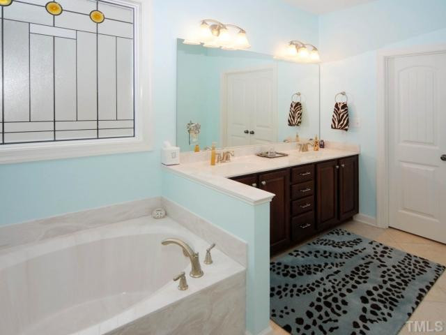 306 Brandywine Drive Raleigh, NC 27607 - Photo 13 of 18 Relax in your garden tub at the end of a busy day!