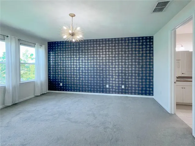 $585,000 | 4721 Arboretum Circle, Unit 201, Naples, FL 34112