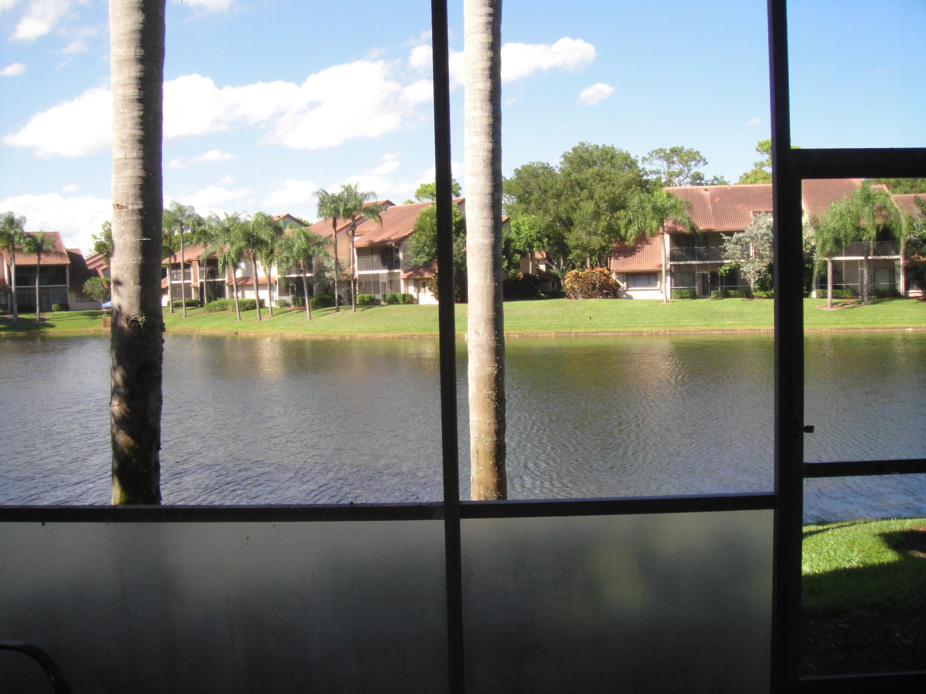 5751 Coach House Circle, Unit B Boca Raton, FL 33486 - Photo 11 of 16 Screened Patio View