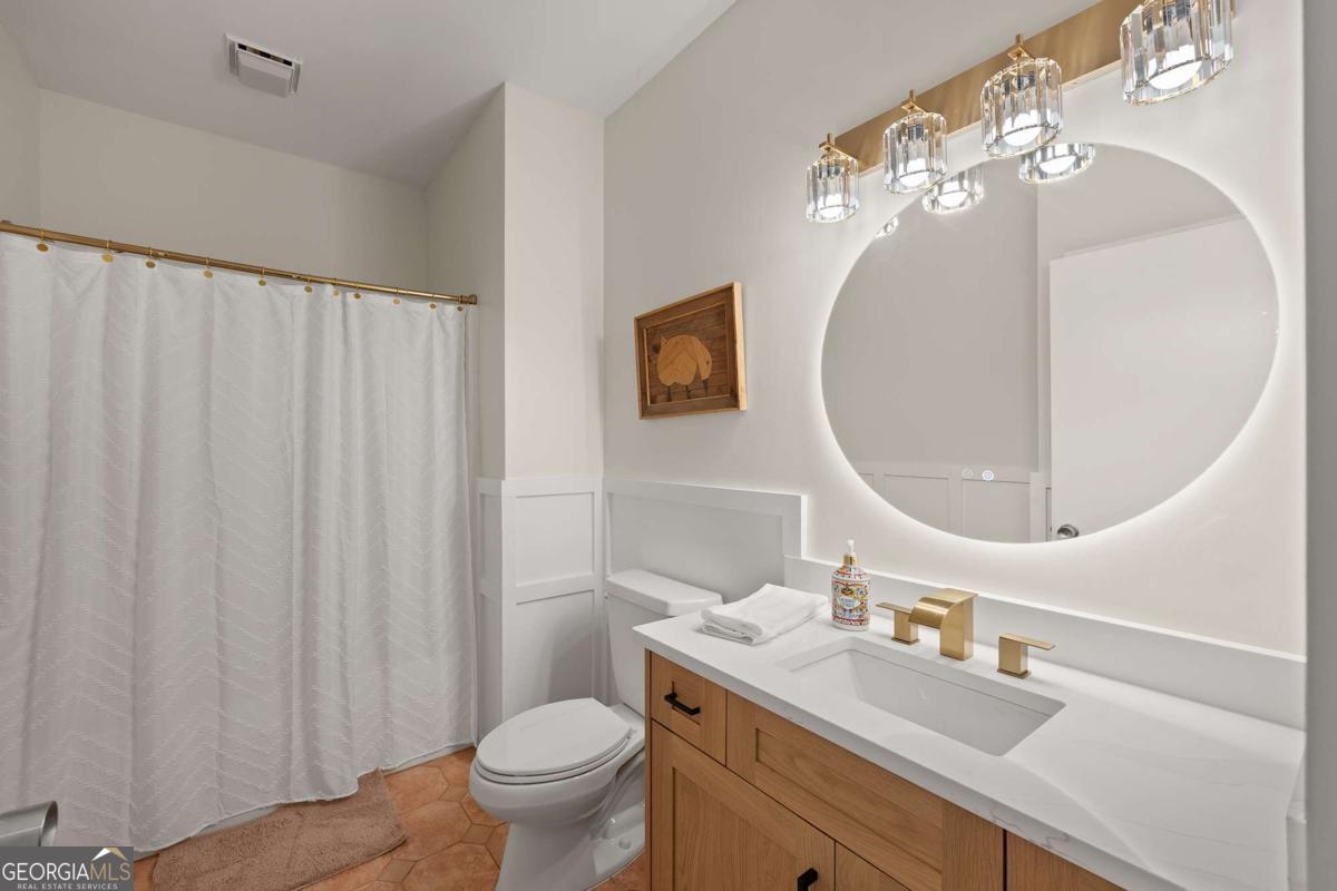 134 Tanner Bluff Athens, GA 30606 - Photo 36 of 45 a bathroom with a sink a toilet and a mirror