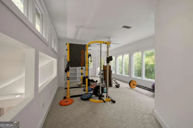 a view of a room with gym equipment