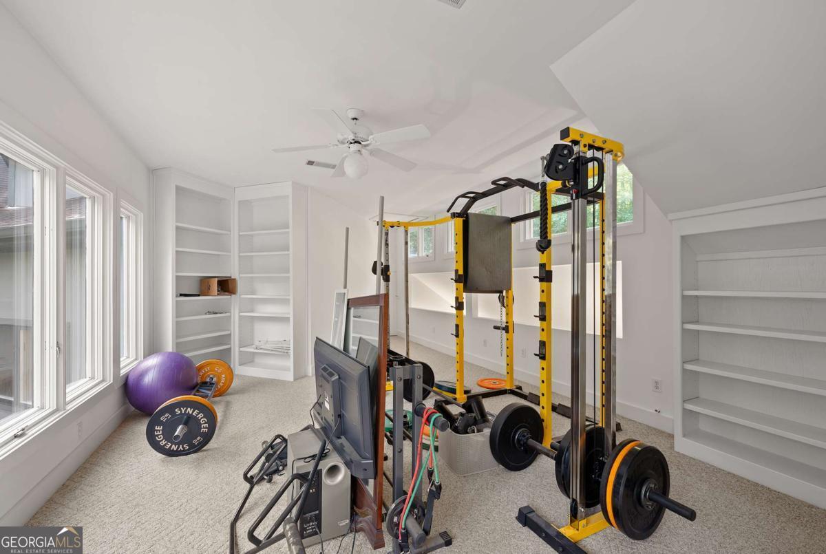 134 Tanner Bluff Athens, GA 30606 - Photo 38 of 45 a view of a room with gym equipment