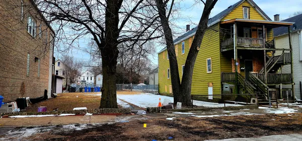 a view of a street with houses