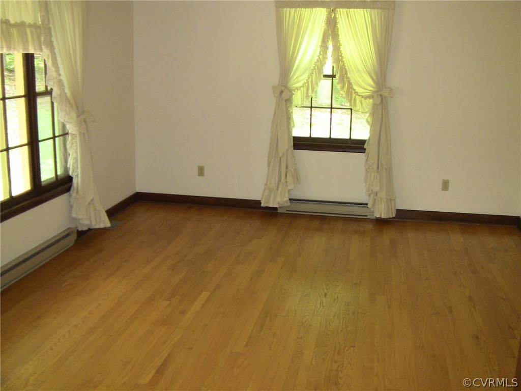 511 Old Hundred Road Midlothian, VA 23113 - Photo 8 of 36 an empty room with windows
