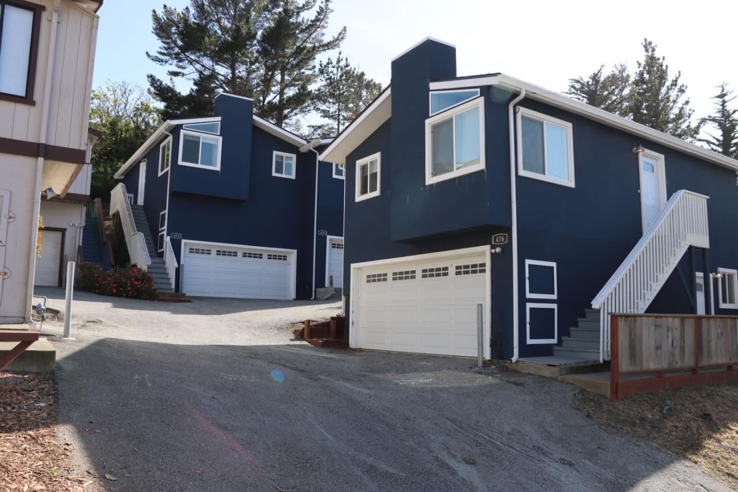 472 Lewis Lane Pacifica, CA 94044 - Photo 1 of 23 a front view of a house with a garage