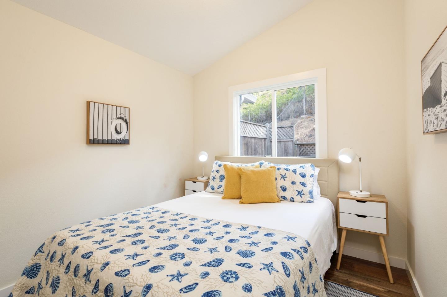 472 Lewis Lane Pacifica, CA 94044 - Photo 15 of 23 a bedroom with a bed and a window