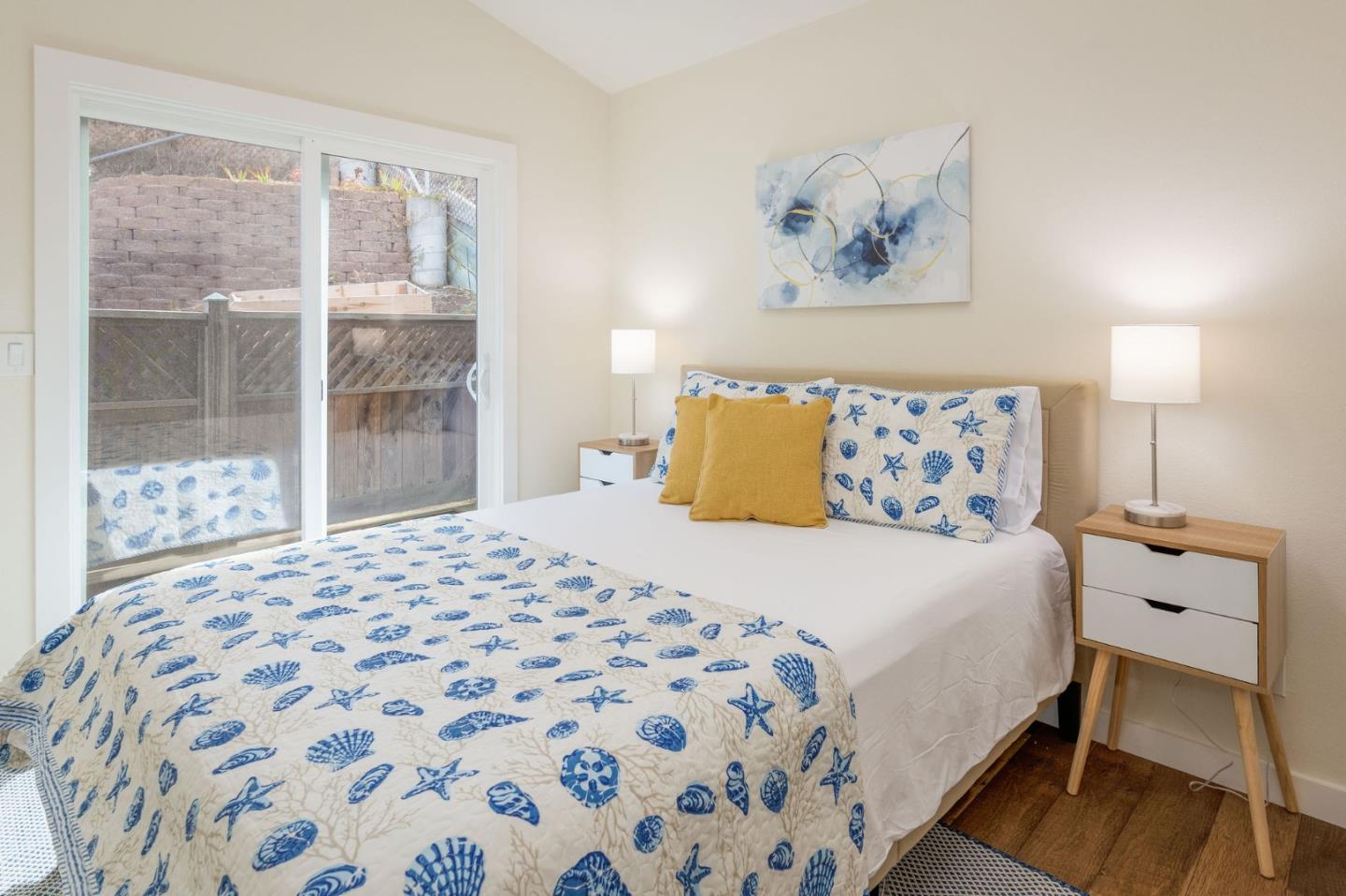 472 Lewis Lane Pacifica, CA 94044 - Photo 17 of 23 a bedroom with a bed and a window