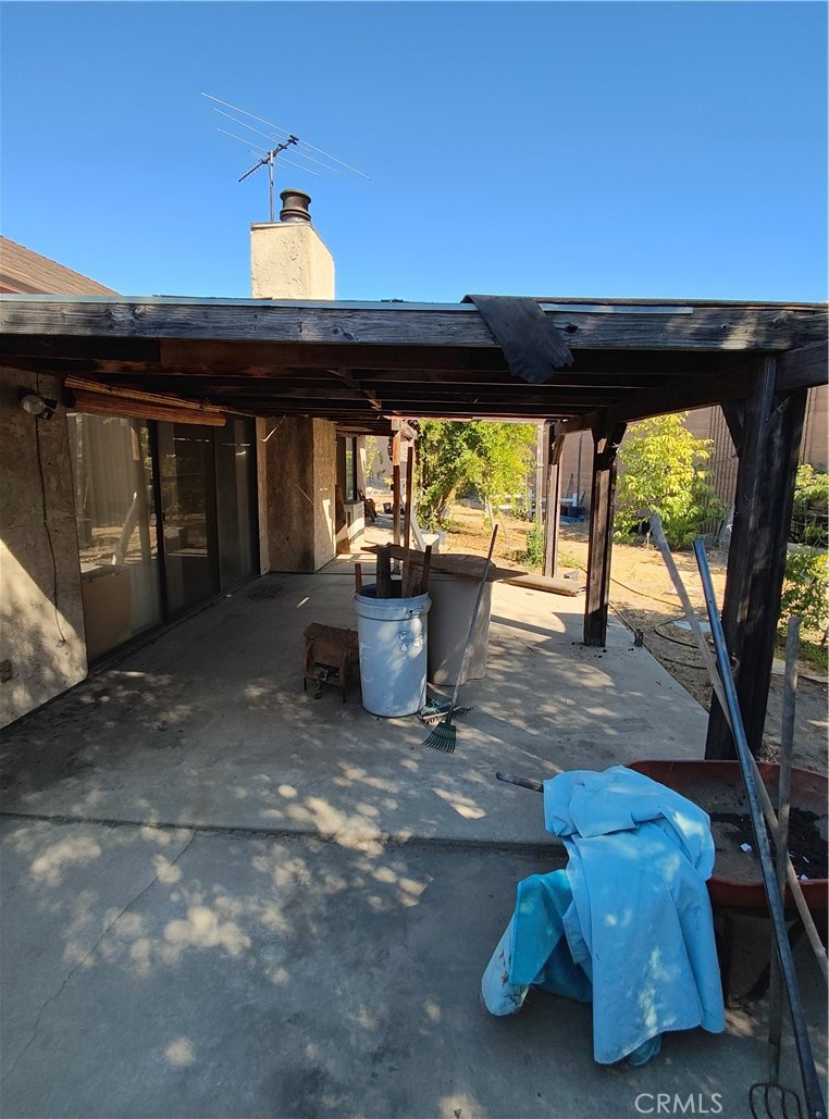 8855 Oneida Avenue Sun Valley, CA 91352 - Photo 8 of 22 a view of a porch with furniture and a yard