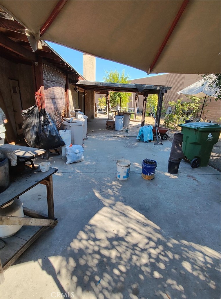 8855 Oneida Avenue Sun Valley, CA 91352 - Photo 9 of 22 a room with lots of furniture and clutter