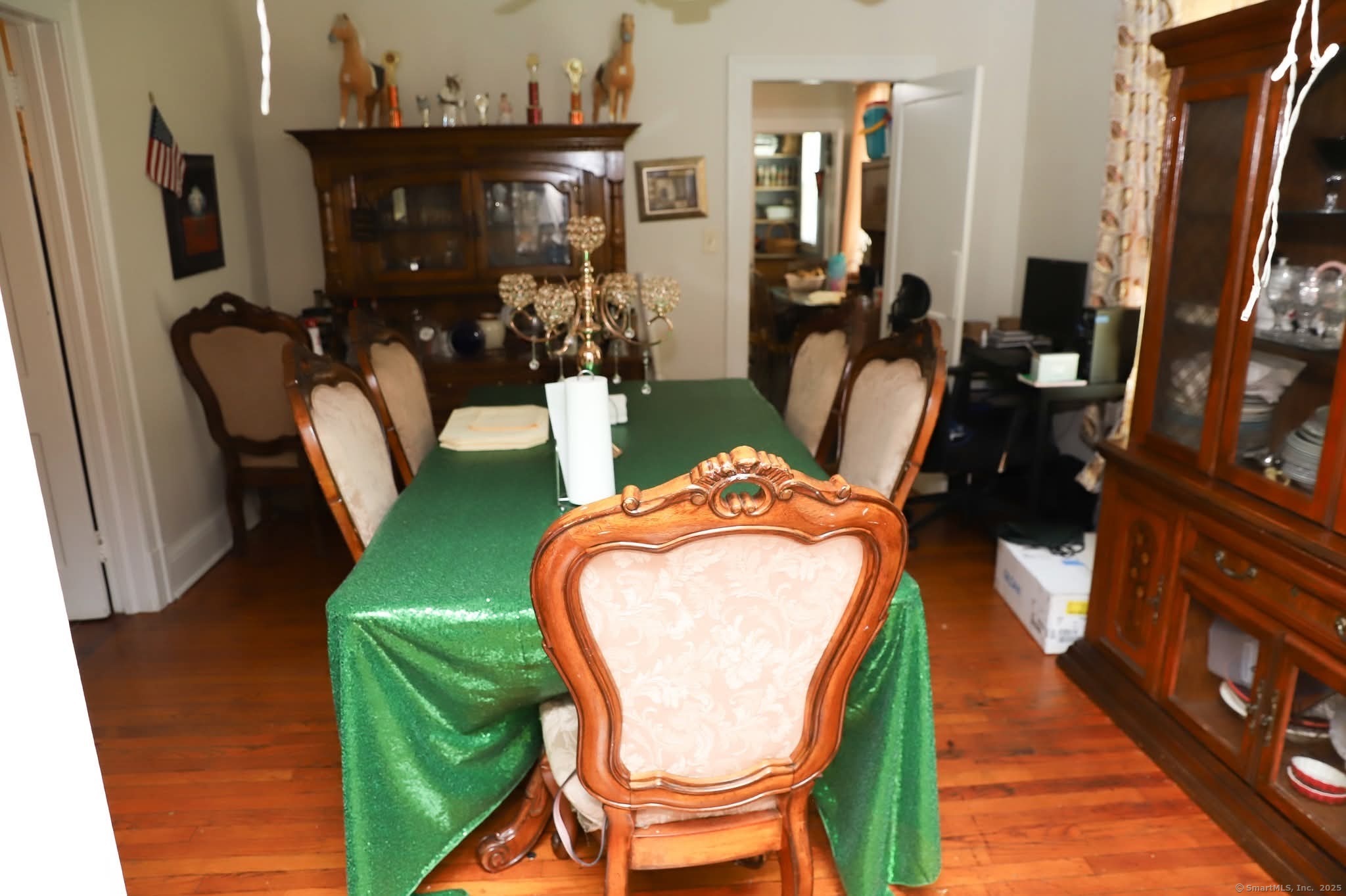 11 Pershing Street Hartford, CT 06112 - Photo 14 of 37 a balcony with chairs and a flat screen tv